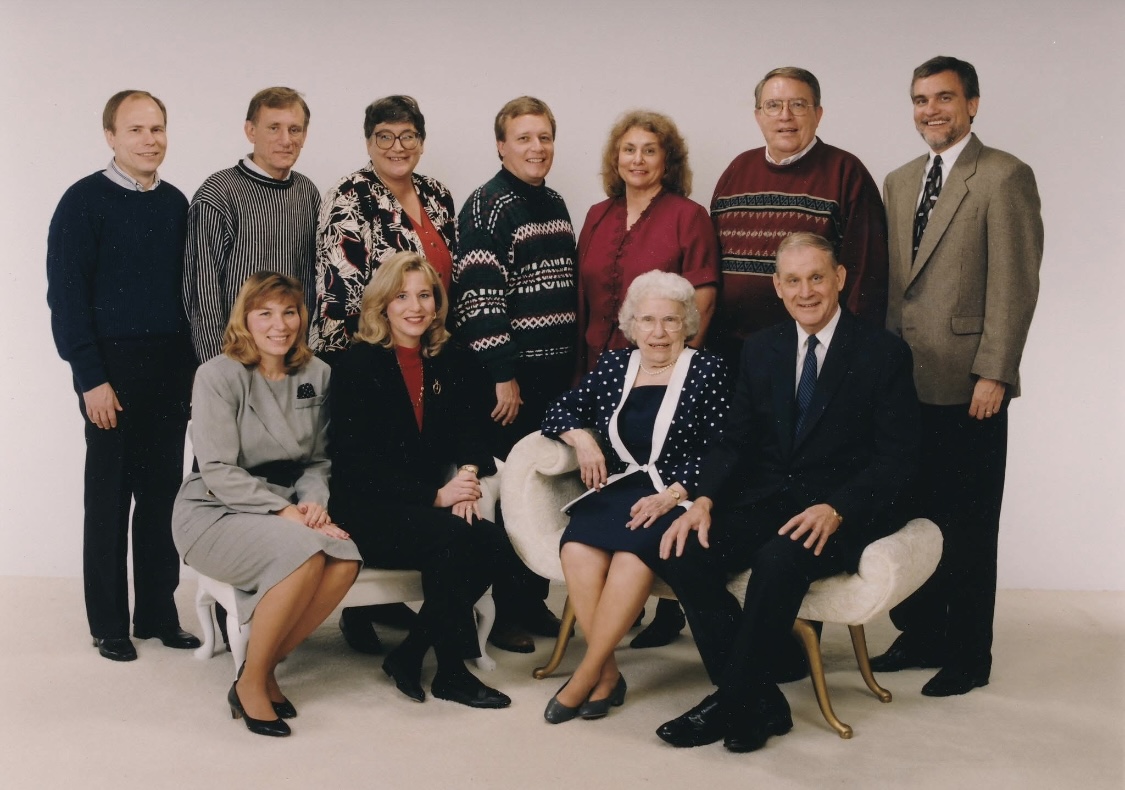 Jim with family members in a group portrait